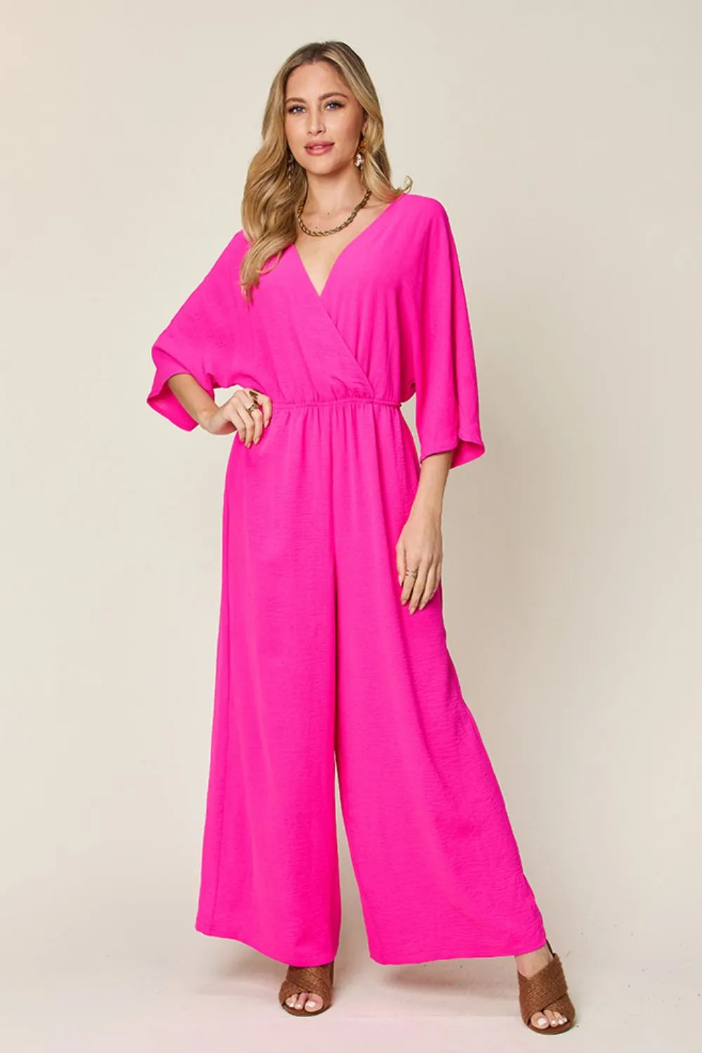 Double Take Full Size Surplice Wide Leg Jumpsuit with Pockets by Trendsi