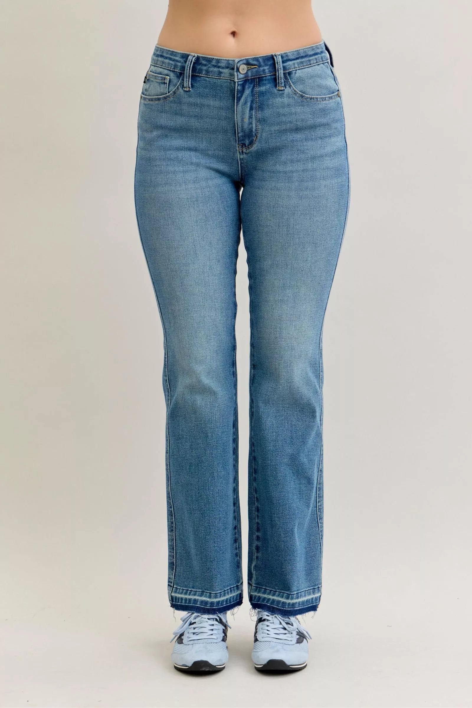 Judy Blue Full Size Mid Rise Slim Bootcut Tummy Control Release Hem Jeans Plus Size by Trendsi