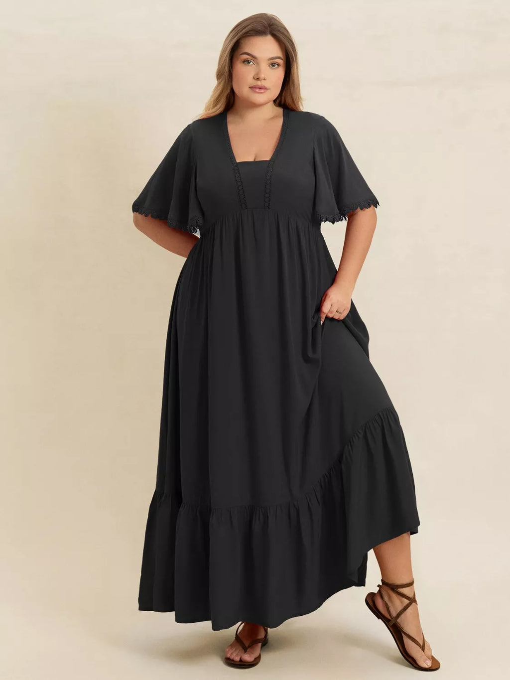Plus Size Boho Ruffled Maxi Dress with Flutter Sleeves by Trendsi