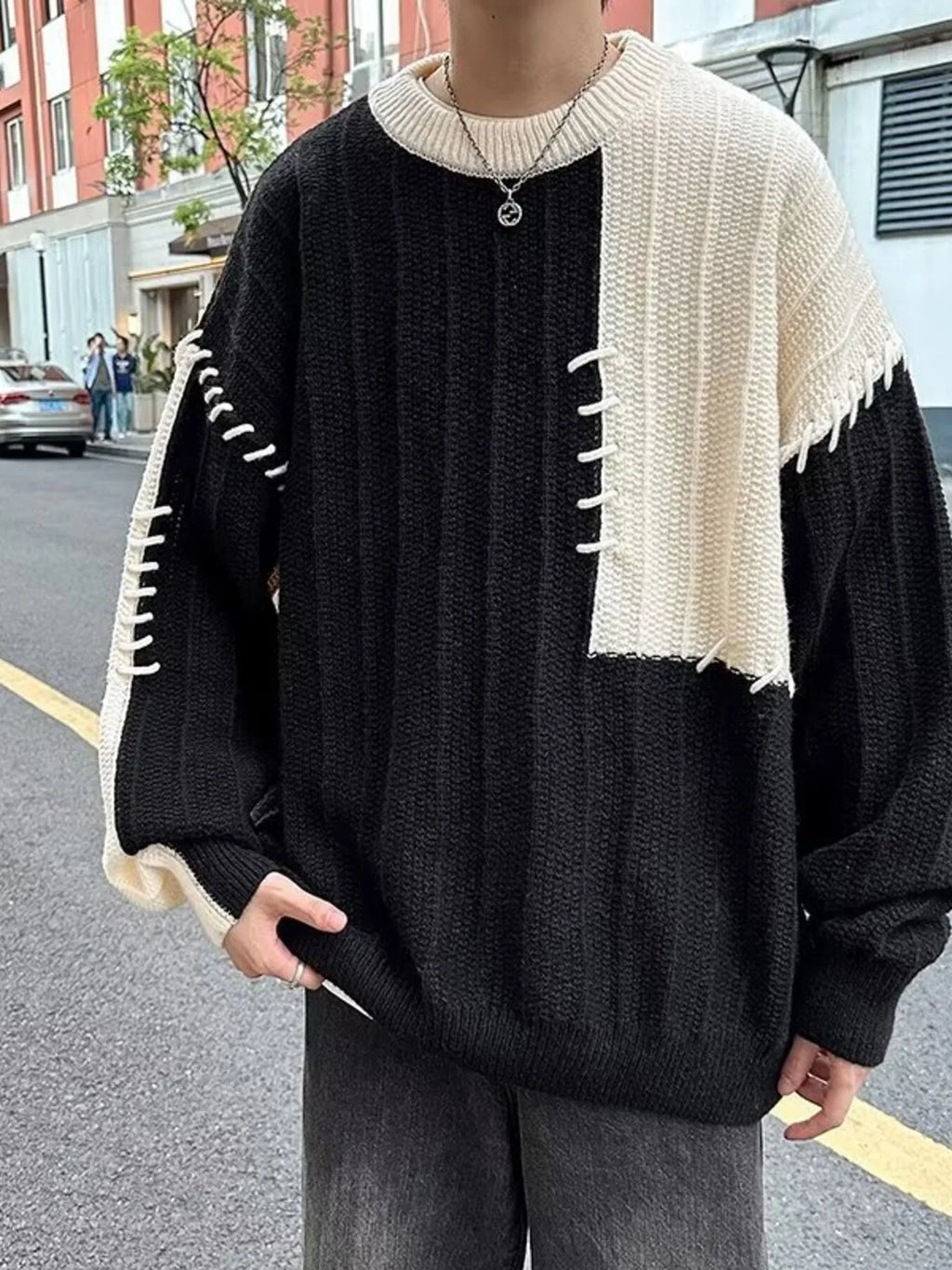 Men's Color Block Round Neck Knitted Pullover by Trendsi