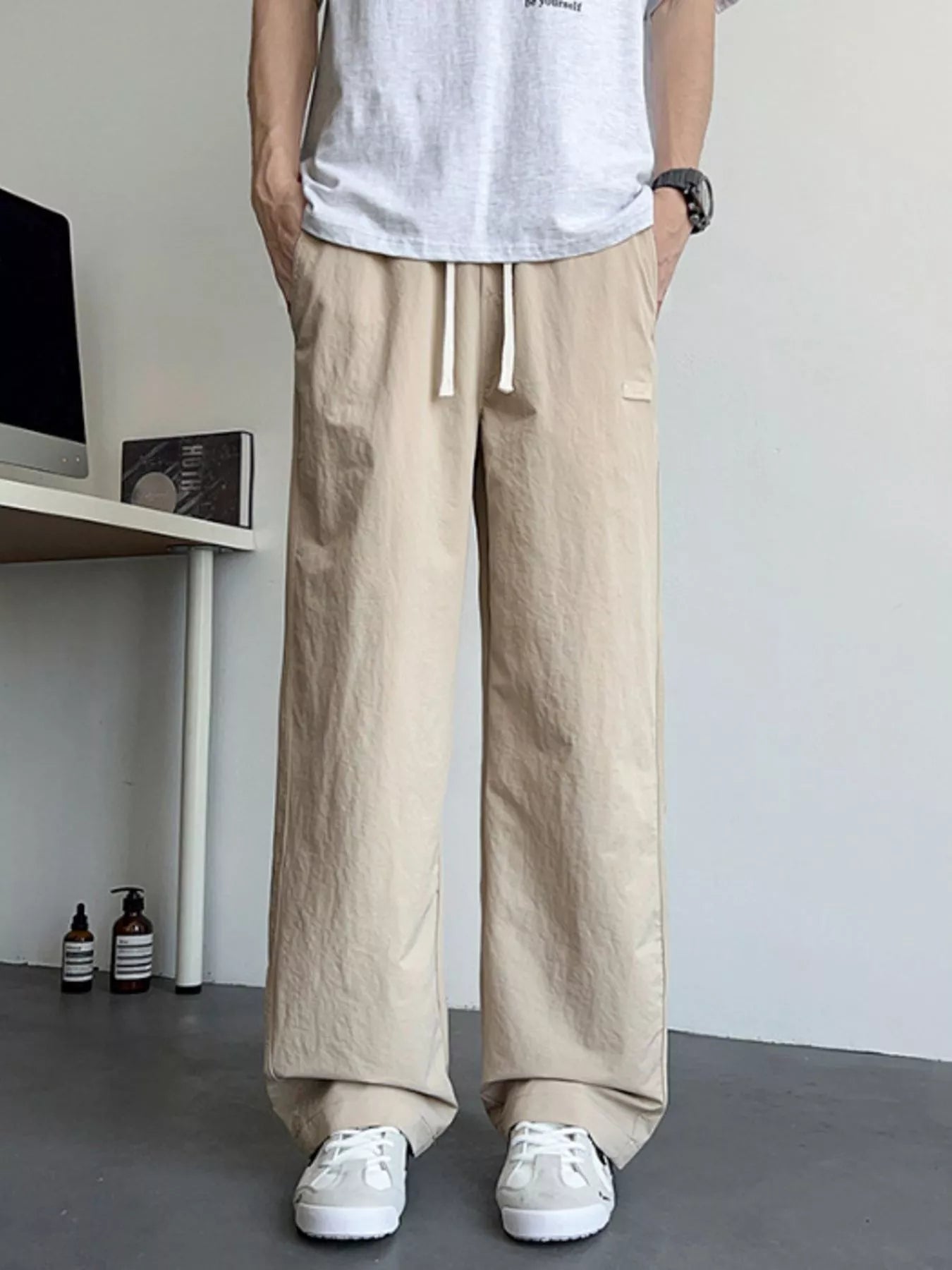Men's Loose Fit Drawstring Casual Pants by Trendsi
