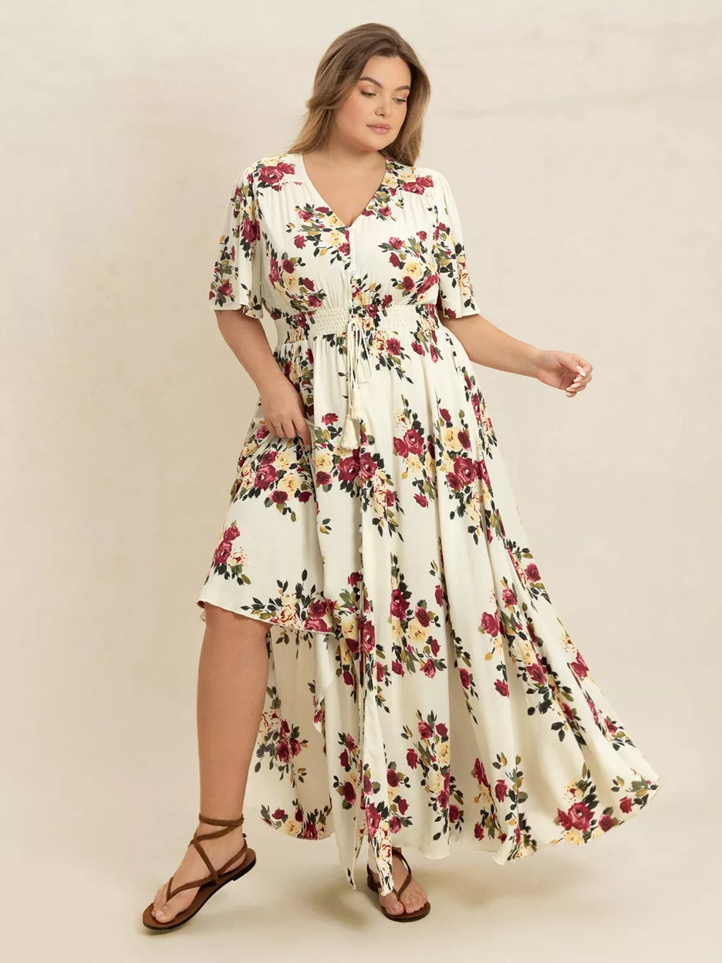 Plus Size Floral Flutter Sleeve Maxi Dress with Button Front by Trendsi