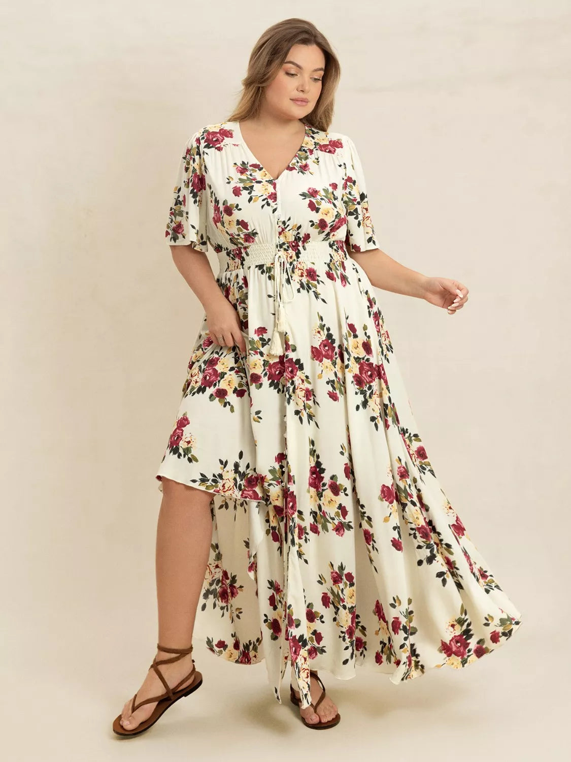 Plus Size Floral Flutter Sleeve Maxi Dress with Button Front by Trendsi