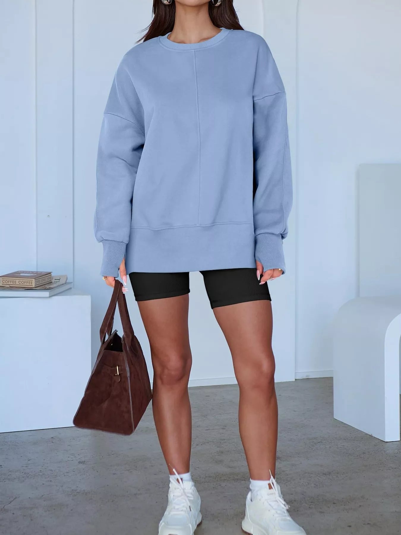 Side Slit Round Neck Long Sleeve Sweatshirt by Trendsi
