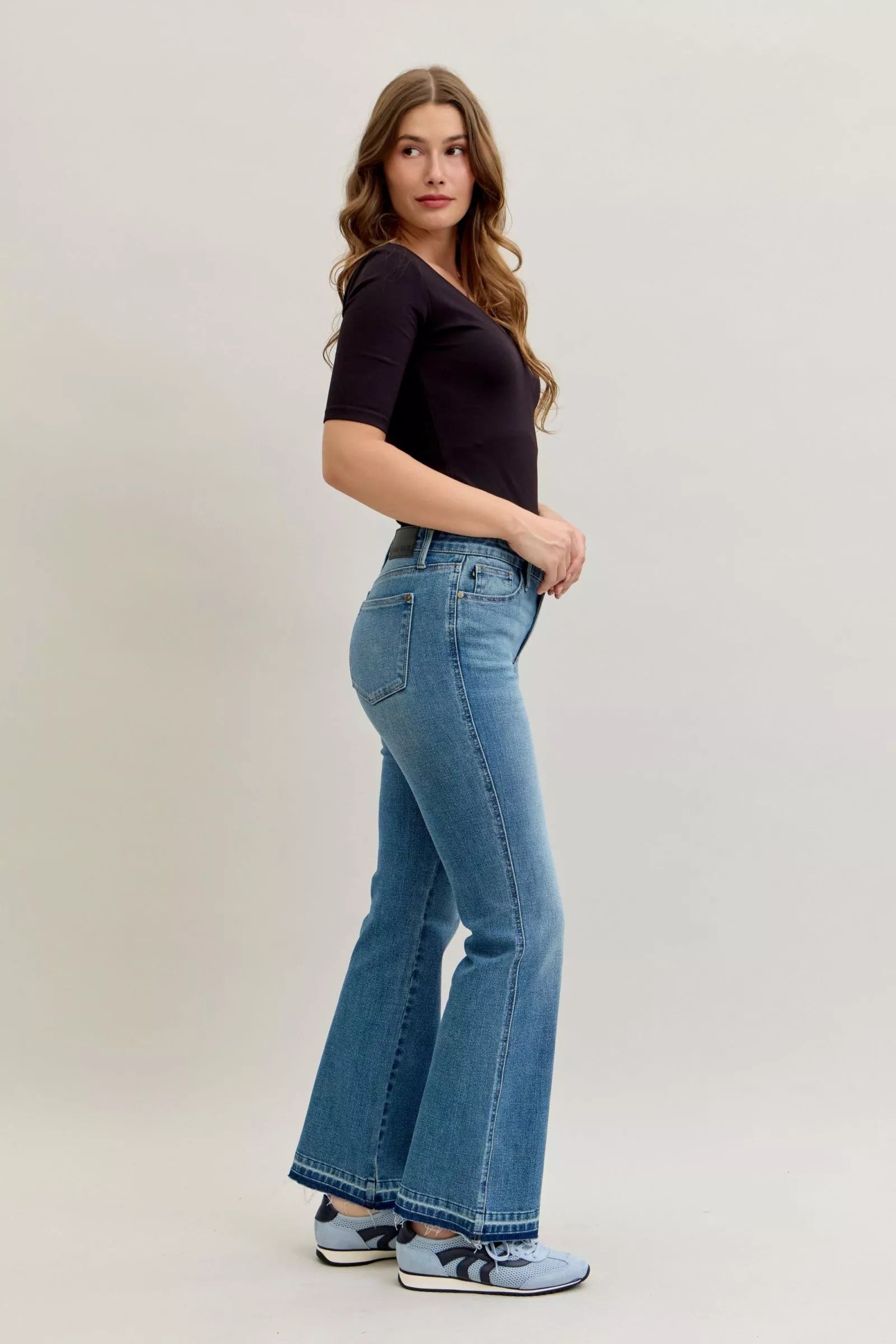 Judy Blue Full Size Mid Rise Slim Bootcut Tummy Control Release Hem Jeans Plus Size by Trendsi