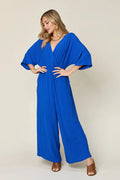 Double Take Full Size Surplice Wide Leg Jumpsuit with Pockets by Trendsi