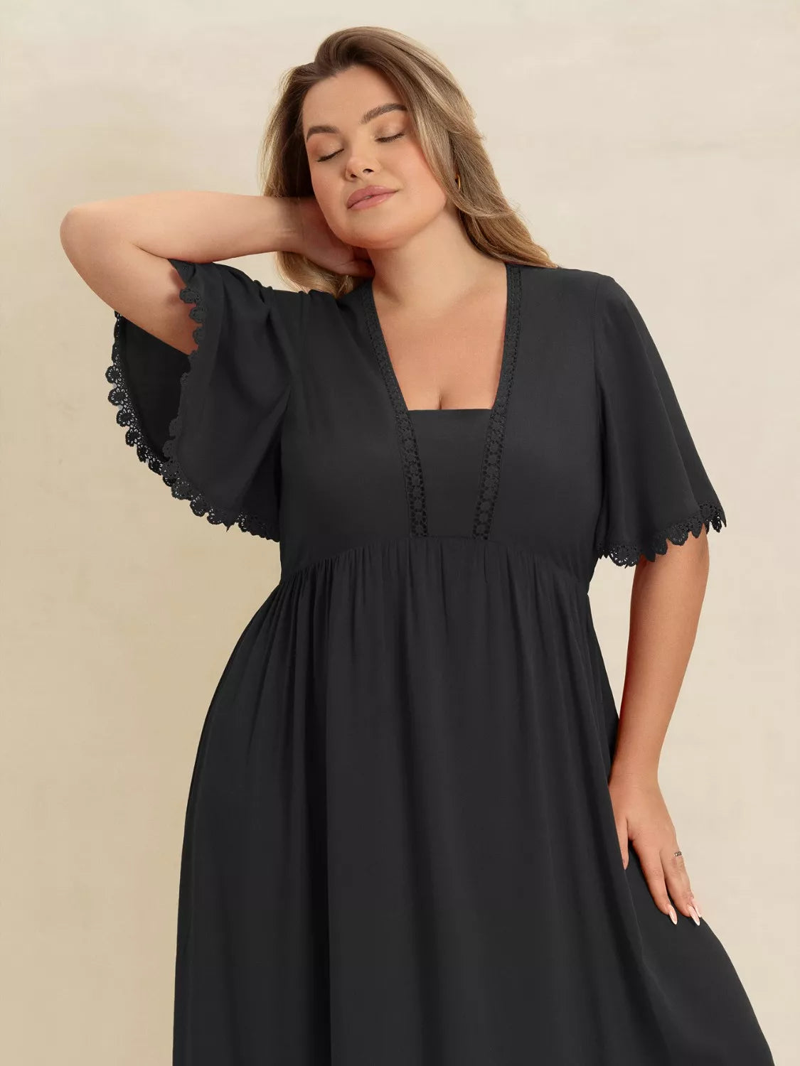 Plus Size Boho Ruffled Maxi Dress with Flutter Sleeves by Trendsi