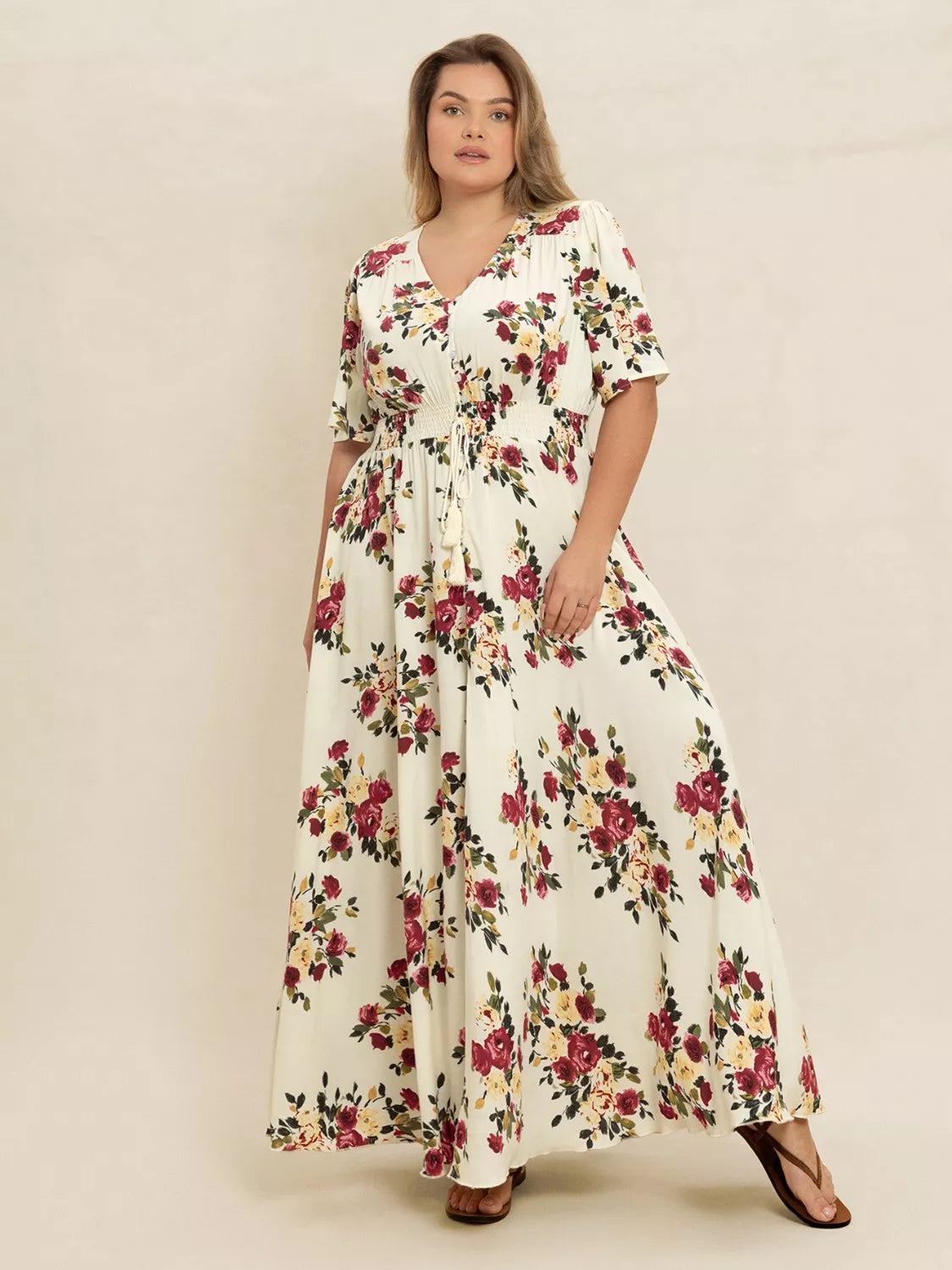 Plus Size Floral Flutter Sleeve Maxi Dress with Button Front by Trendsi