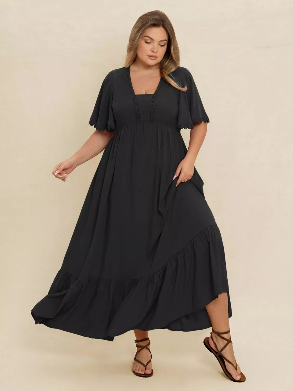 Plus Size Boho Ruffled Maxi Dress with Flutter Sleeves by Trendsi