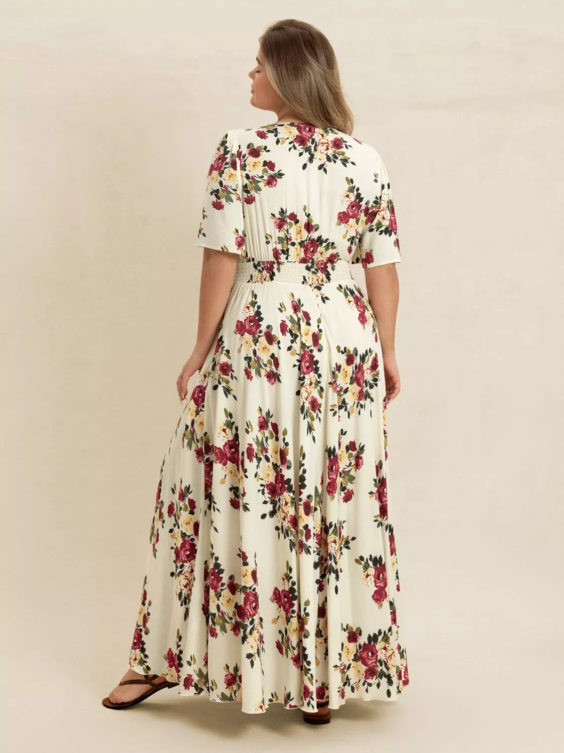 Plus Size Floral Flutter Sleeve Maxi Dress with Button Front by Trendsi