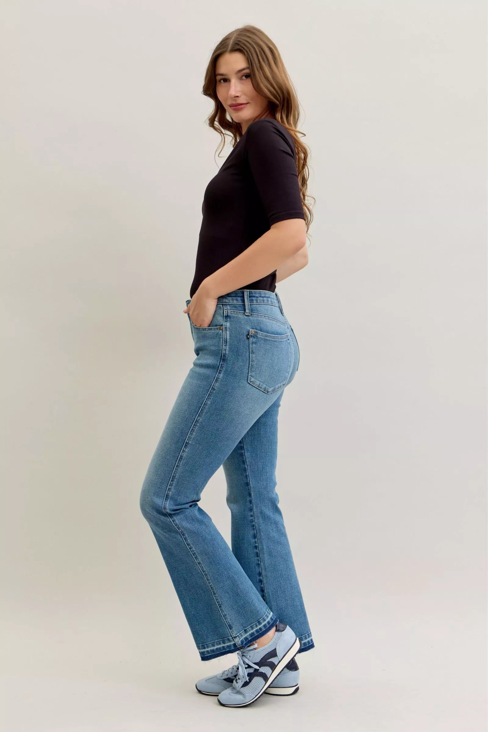 Judy Blue Full Size Mid Rise Slim Bootcut Tummy Control Release Hem Jeans Plus Size by Trendsi