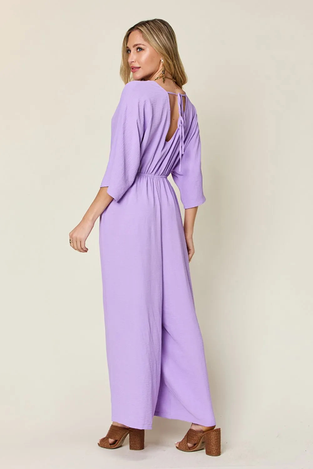 Double Take Full Size Surplice Wide Leg Jumpsuit with Pockets by Trendsi