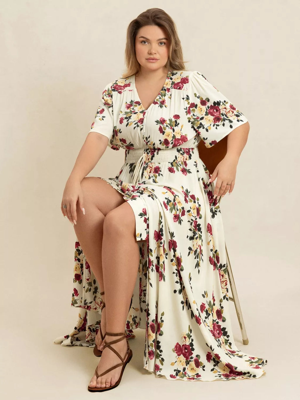 Plus Size Floral Flutter Sleeve Maxi Dress with Button Front by Trendsi