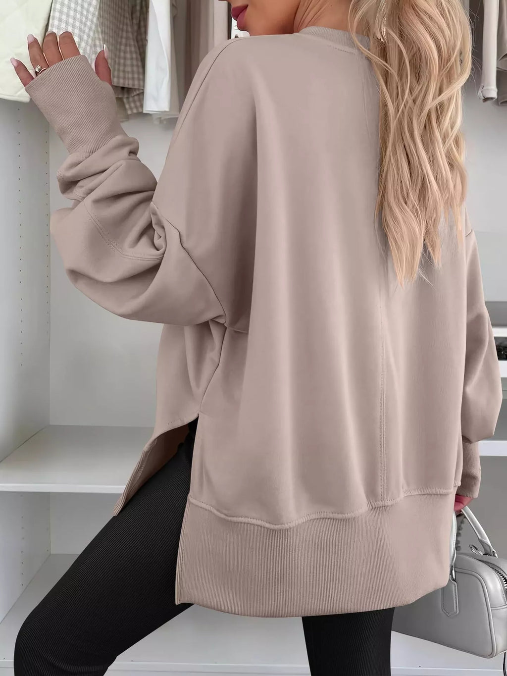Side Slit Round Neck Long Sleeve Sweatshirt by Trendsi