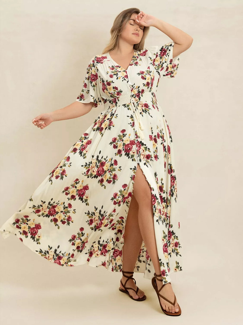 Plus Size Floral Flutter Sleeve Maxi Dress with Button Front by Trendsi