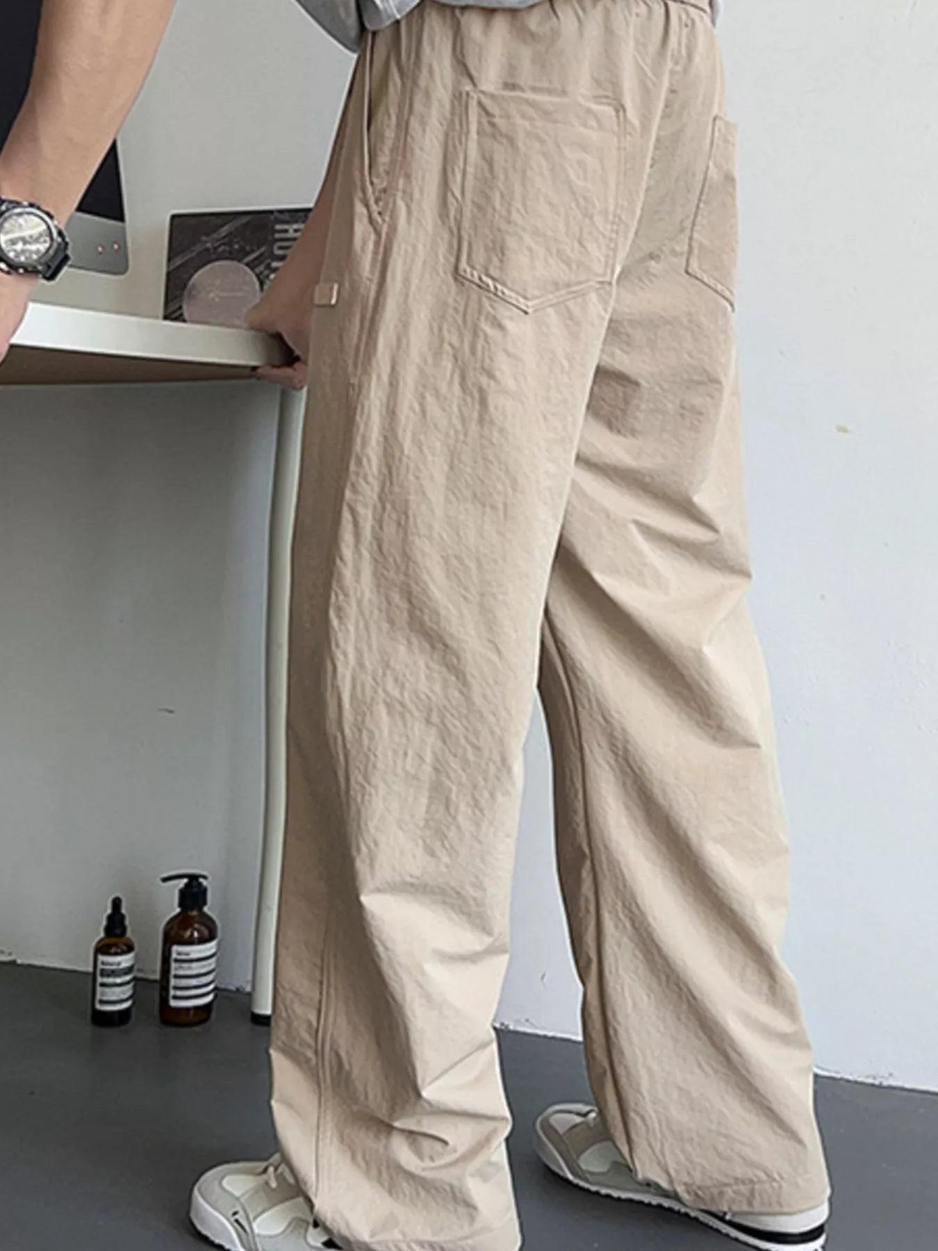 Men's Loose Fit Drawstring Casual Pants by Trendsi