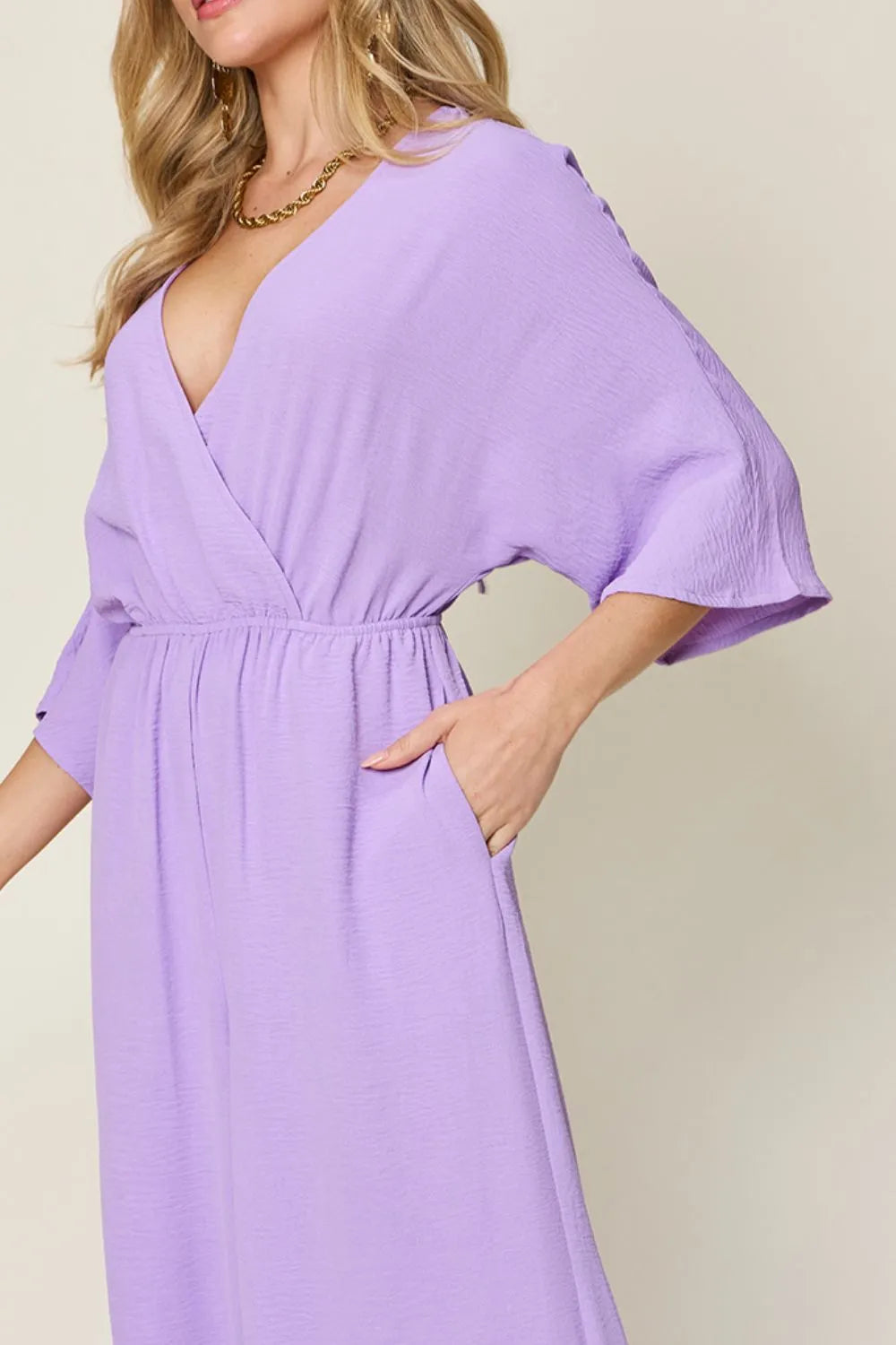 Double Take Full Size Surplice Wide Leg Jumpsuit with Pockets by Trendsi