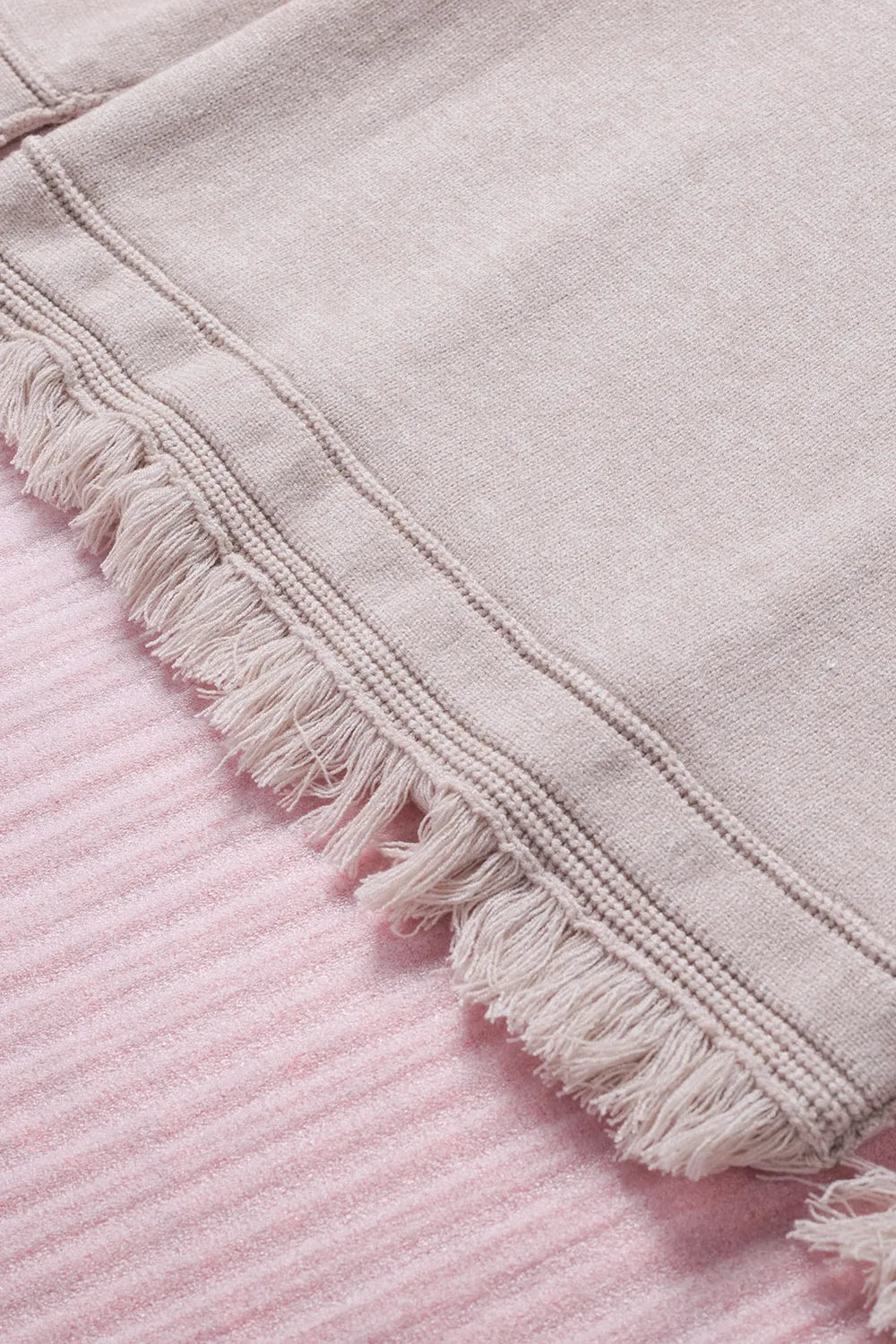 Exposed Seam Fringe Hem V-Neck Long Sleeve Sweater by Trendsi