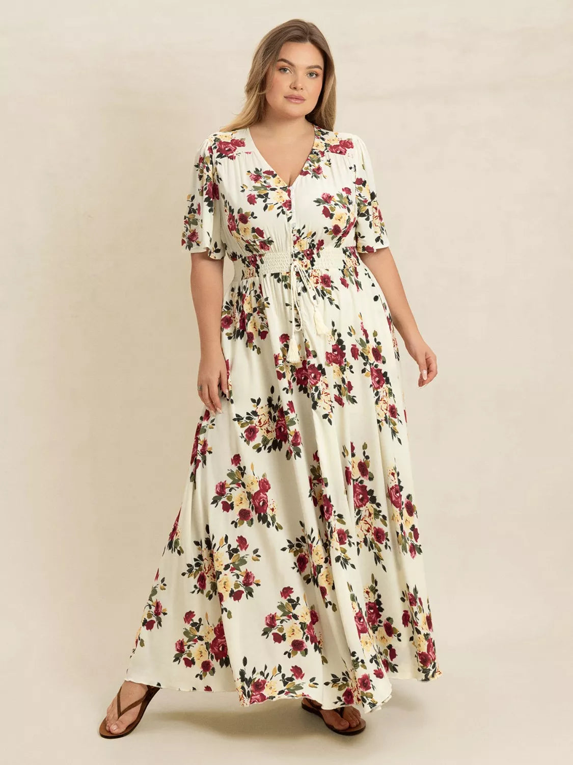 Plus Size Floral Flutter Sleeve Maxi Dress with Button Front by Trendsi