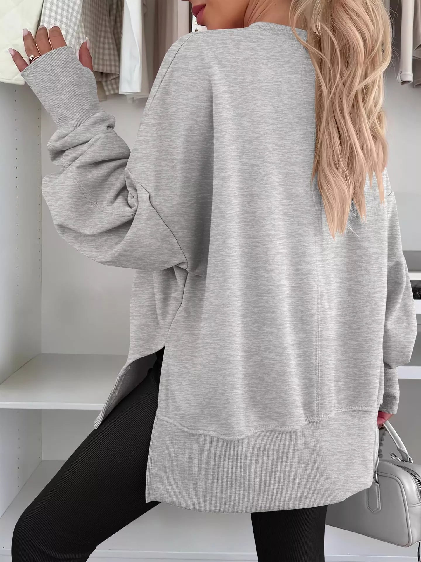 Side Slit Round Neck Long Sleeve Sweatshirt by Trendsi