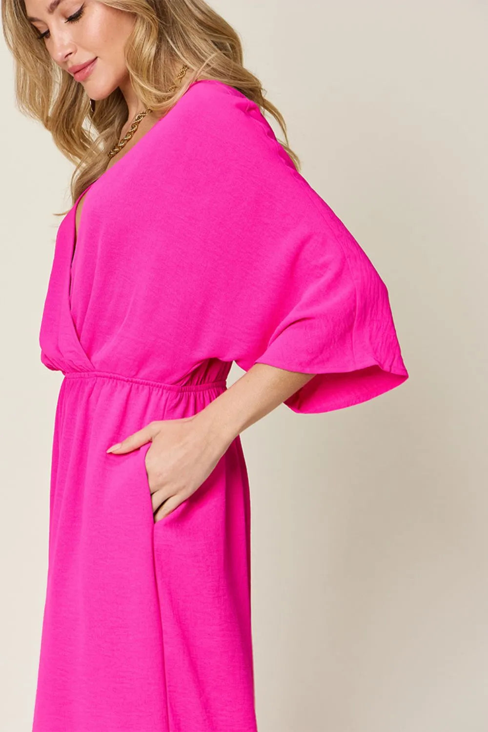 Double Take Full Size Surplice Wide Leg Jumpsuit with Pockets by Trendsi