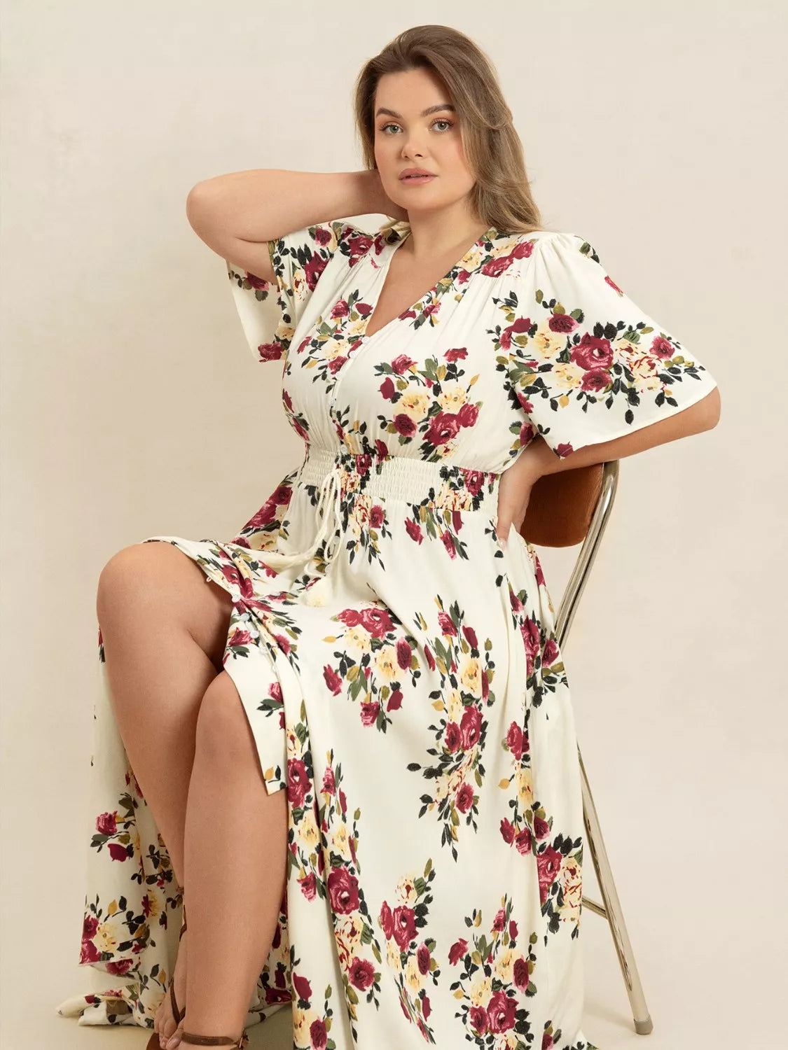 Plus Size Floral Flutter Sleeve Maxi Dress with Button Front by Trendsi